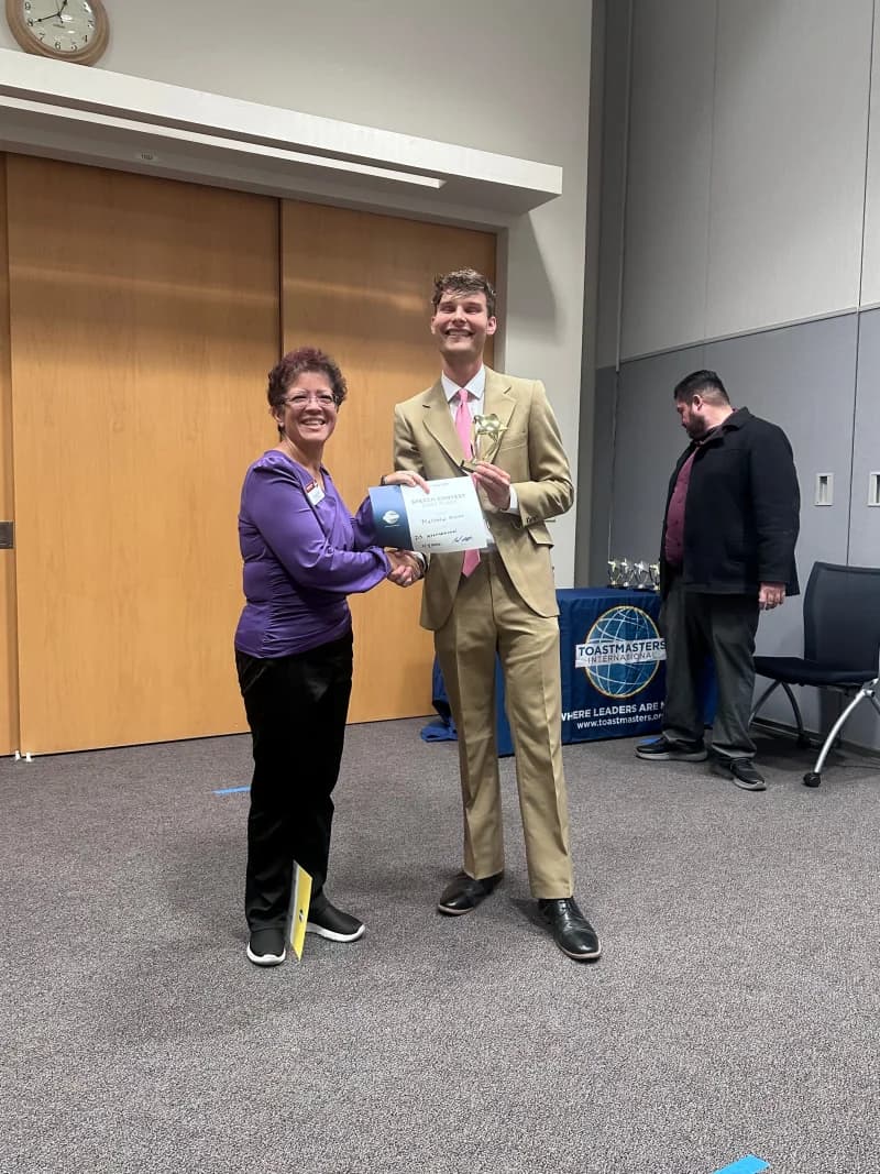 Matt Malan receiving Best Speaker award at the Toastmasters Area Contest