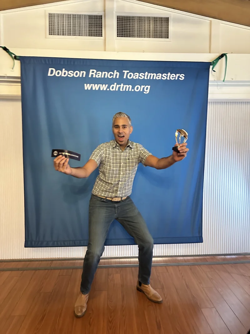 Rupesh Parbhoo celebrating a Best Speaker award at Dobson Ranch Toastmasters